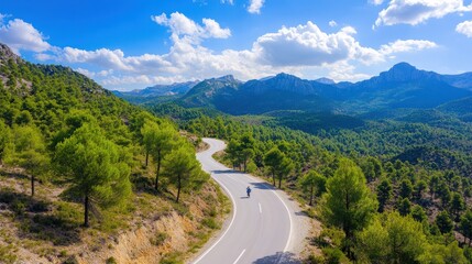 Curvy Mountain Road Through Lush Green Landscape