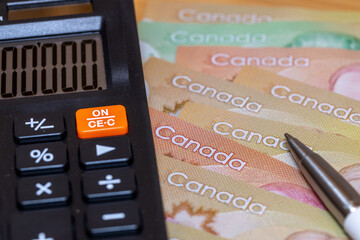 Canada dollars. Canadian money and calculator, business concept, Financial calculations