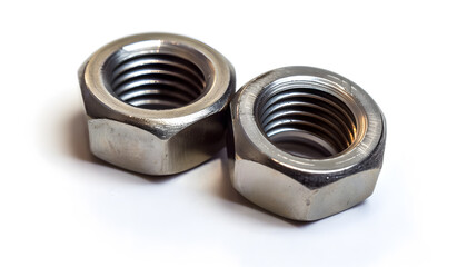 Two metal nyloc nuts on white background