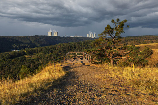 Landscape around Dukovany nuclear power plant. In the foreground, the Mohel steppe and a valley with a water reservoir.