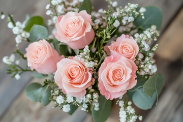 Obraz premium Soft Pink Roses with Delicate White Flowers Arrangement