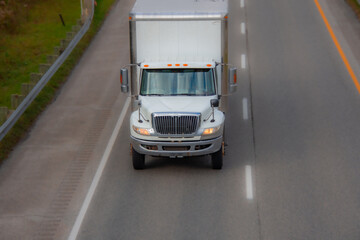 Heavy truck on a Canadian highway in the fall in Quebec