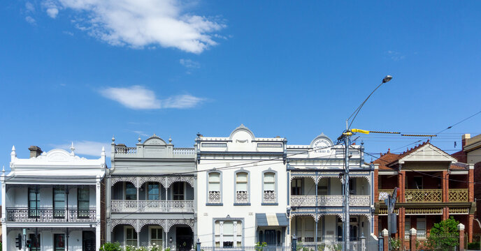 Melbourne&rsquo;s Heritage Architecture. Charming Terraced Houses with Decorative Iron Lacework (filigree) in Victorian style. Fitzroy Neighbourhood, Melbourne, Australia.