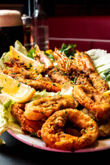 fried shrimps with lemon and parsley