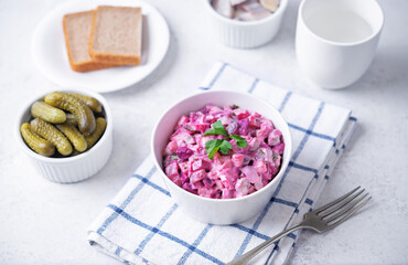Beet hirring mayonnaise salad vinaigrette in a bowl