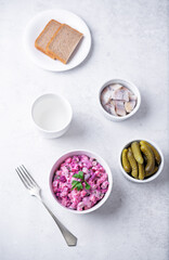 Beet hirring mayonnaise salad vinaigrette in a bowl