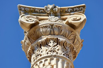 Architectural detail of a corinthian order column capital showing acanthus leaves decoration