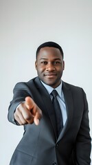 Businessman pointing forward confidently