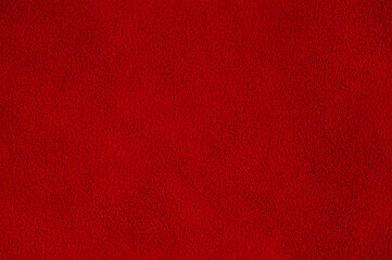 Red suede background macro photo. Suede texture.