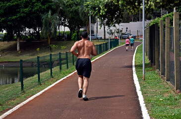 Adult man running on public park in Ribeirao Preto, Sao Paulo, Brazil