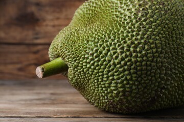 Fresh exotic jackfruit on wooden table, closeup