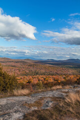 Coney Mountain Summit in Tupper Lake NY Adirondacks on an early Autumn afternoon with peak fall foliage