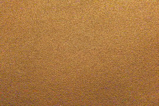 Bronze texture background. Brown bronze gold sand surface texture background