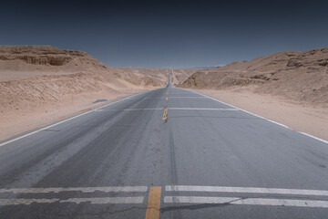 Close up on the concrete path of the highway connecting Qinghai and Xinjiang in China