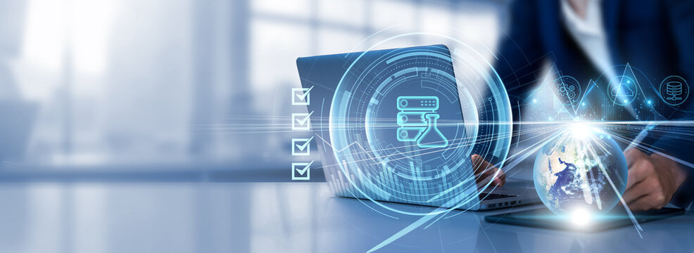 Data Science: Analytics, machine learning, statistics, predictive modeling, algorithms. Businessman selects a checkbox and uses a laptop analyzing data graph growth on global network.