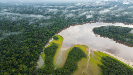 NANAY RIVER IN THE PERUVIAN JUNGLE, A LARGE AND COLORFUL BLACK WATER RIVER IN THE DEPTHS OF THE...