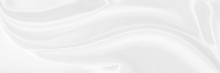 Obraz premium White gray satin texture that is white silver fabric silk panorama background with beautiful soft blur pattern natural.