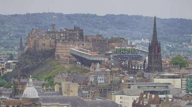 Edinburgh city with aerial view of city landscape with Edinburgh castle and tour tourism walk for shopping in Royal miles street travel destination in Scotland, north of UK, United Kingdom
