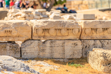 A stone wall with a few holes in it, Acropolis in Athens