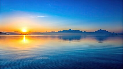 Naklejka premium Minimalist sunrise over the sea with blue mountains and lake