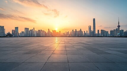 Obraz premium Vacant asphalt square and Shanghai city skyline at sunset