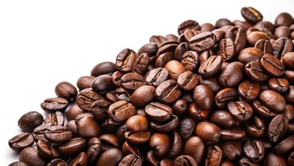 Naklejka premium Dark roasted Arabica coffee beans on white background with copy space, forced perspective