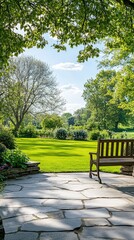 Fototapeta premium Empty bench sitting on stone patio in tranquil garden setting