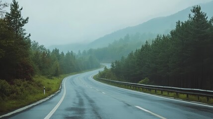 Road in foggy mountains