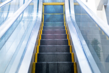 Modern Escalator Going Upwards