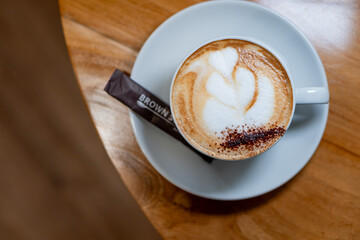 Artistic Latte on Wooden Table