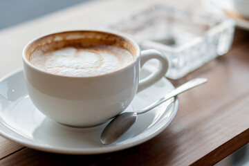 Cozy Latte in a Cafe Setting