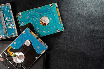 Close-Up of Hard Disk Drives on Dark Surface