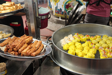 Steamed dim sum for sale in Jalan Alor a street food night market located in the Bukit Bintang area, Kuala Lumpur. 