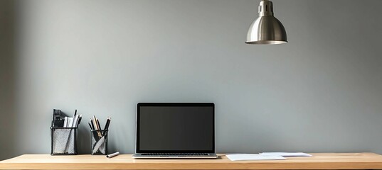 Minimalist Home Office Workspace with Laptop and Desk Lamp