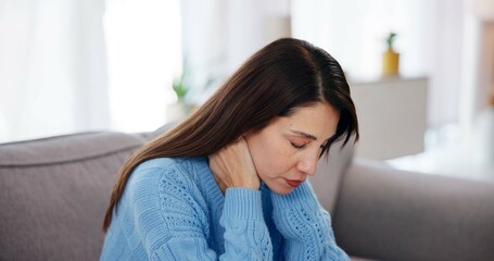 Woman, neck pain and stress on sofa in home with muscle tension, injury and burnout. Person, body strain and uncomfortable on couch with inflammation, fibromyalgia and joint pressure in living room