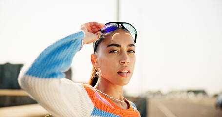 City, woman and portrait with sunglasses for fashion, streetwear and confidence for cool clothes...