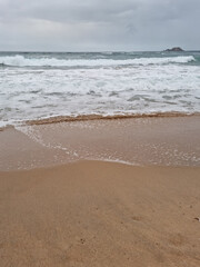 
It is Sampo Beach under a cloudy sky.