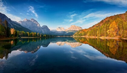 Fototapeta premium The lake is a canvas reflecting the changing sky. 