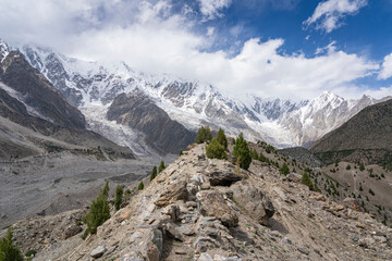 Obraz premium Summer landscape view of Chongra glacier and snow-capped mountains near Tarishing village, Astore, Gilgit-Baltistan, Pakistan