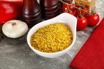 Dry wheat bulgur cereal heap