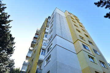 Perspective view of flat of blocks from Communist period, worn out concrete buildings in Eastern Europe