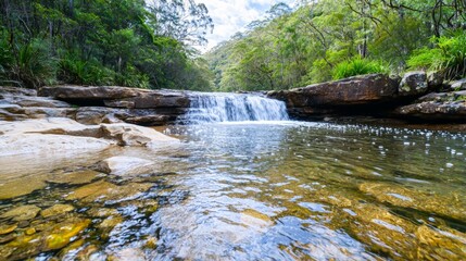 Tranquil Hidden Waterfall in Blue Natural Landscape