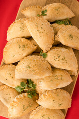 Meat Pies Stacked on a cutting board © Cavan