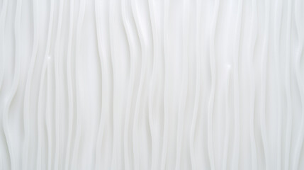 Obraz premium A close-up image of a white textured surface with flowing, organic lines. 