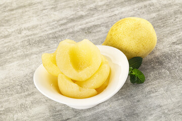 Canned yellow pear with syrup