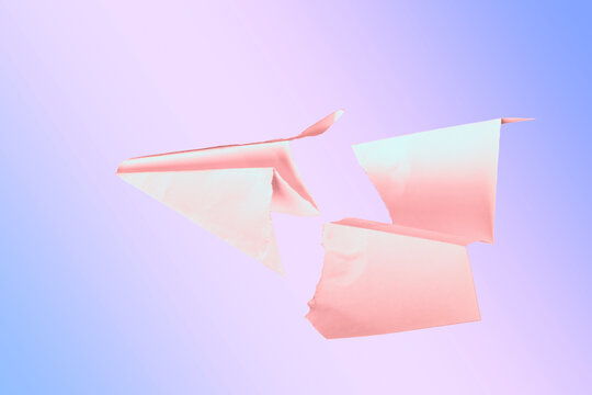paper plane in the middle it is torn. concept of breakdown, accident, crash, does not work. close-up.
