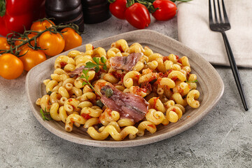 Italian pasta cellentani with anchovy