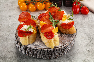 Bruschetta tapas with chorizo and tomato