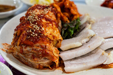 Bossam, a Korean cuisine composed of kimchi and boiled pork