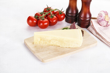 Piece Italian hard parmesan cheese